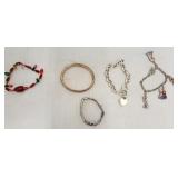 Lot of costume jewelry bracelets ranging in size