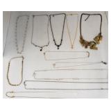 Lot of costume jewelry necklaces with one broken