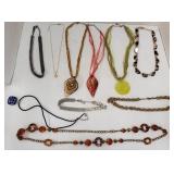 Costume jewelry necklaces ranging in length from