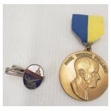 Nagasaki pin and Paul Harris Fellow pin