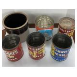 Assorted vintage cans and crock