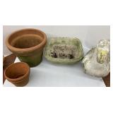 Outdoor planters and decorative duck