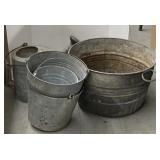 Assorted metal buckets and watering can