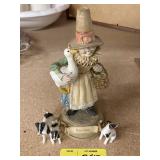 Mother Goose and Porcelain Dog Figurines