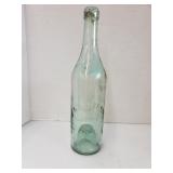 Antique blown glass foreign bottle