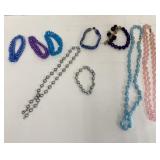 Assorted bracelets and necklaces 
22"
20"
16"