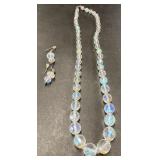 Costume jewelry necklace is size 22"