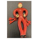 Plastic bellhop brooch