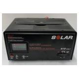 Solar 6/12 volt battery charger model 1014C.