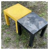 2 plastic outdoor tables with removable legs.