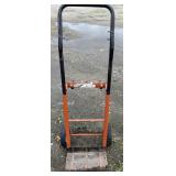 Orange dolly with rubber wheels