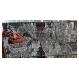 Contents of shelf. Assorted glass pieces & pig