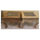 Glass top end table w/ claw feet 28" W x 24" H.