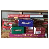 Assorted Christmas lights and light storage