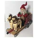 Santa on a horse drawn wagon Christmas decoration