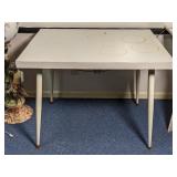 Pressed Board Table with Metal Legs, damage as