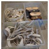 Totes of equestrian supplies including horse