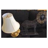 French horn lamp and lion sculpture