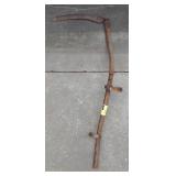 Wooden farming scythe