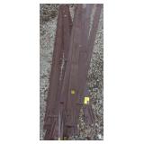 Pile of Brown Metal Landscape Edging.  8