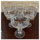 Set of 6 gold rim glasses