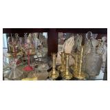 Contents of shelf. Candlestick holders, Decanter,