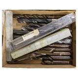 Flat of various large drill bits