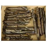 Flat of various large machine drill bits