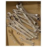 Flat of various sized wrenches