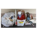 Lot of Various Sealants and Chipping Hammer