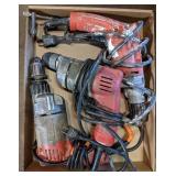 Flat of Milwaukee drills including 3/8" and 1/2"