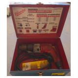 Milwaukee heavy duty hammer drill w/ bits and box