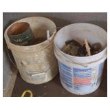 2 buckets of shop materials
