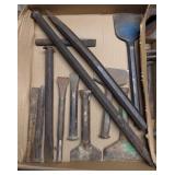 Flat of iron spikes and chisels