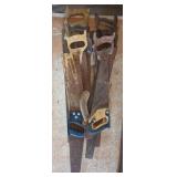 Lot of assorted handsaws with wood and plastic