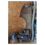 Various automotive parts including a fender and