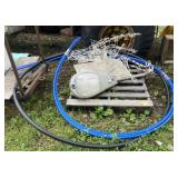 Pallet of plastic tubing, sink, Christmas lights,