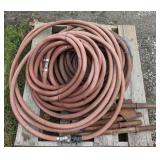 Pallet of Iron spikes and Kelly Mach Co hose