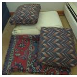 (B) Lot of throw pillows and blankets