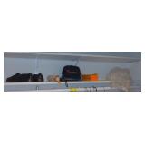 Contents of shelf w/ umbrella and hats