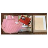 Lots with knit sweater, magazines and pictures of