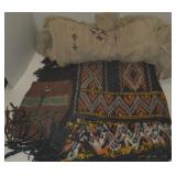 Lot including blanket, dress, and waist pouch