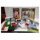 (JJ)  Lot of misc items.  Shop click, beanies,
