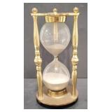 (AO) Brass hour glass.  Measures 9 inches