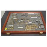 (AO) Display case with various apothecary weight.