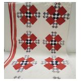 (AO) Old quilt. Measures 54 inches by 66 inches.