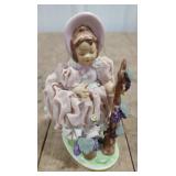 (P) Porcelain girl figure measuring 5" tall