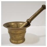 (AO) Apothecary  mortar and pedstle. Measures a