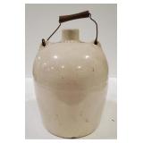 (AO) Old jug with wire and wood handle Has a