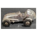 (JJ) plastic race car. Measures 6.5 inches